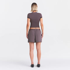 NikeSKIMS STRETCH NYLON 5" TRACK SHORT | RESIN ON A MODEL FRONT VIEW