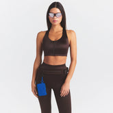 NikeSKIMS SATIN SHINE RACER BACK ZIP FRONT BRA | PHOENIX ON A MODEL SIDE VIEW @ | FOCUS: 0.0, 1.0, 0.9
