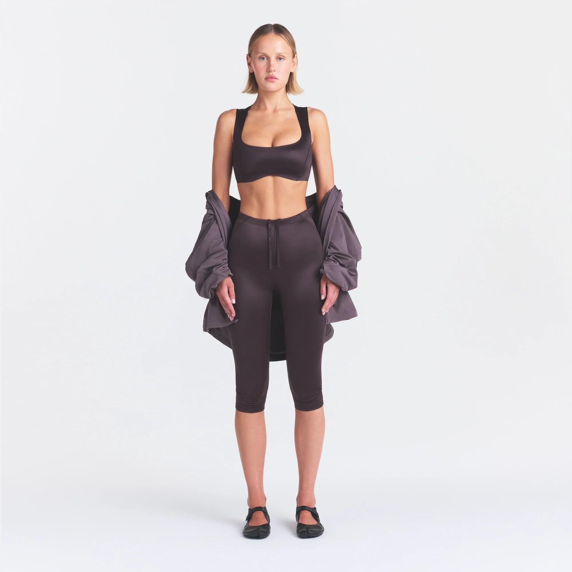 NikeSKIMS SATIN SHINE WIDE SCOOP BRA | PHOENIX ON A MODEL FRONT VIEW @ | FOCUS: 0.0, 1.0, 0.9