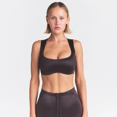 NikeSKIMS SATIN SHINE WIDE SCOOP BRA | PHOENIX ON A MODEL SIDE VIEW @ | FOCUS: 0.0, 1.0, 0.9