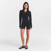 NikeSKIMS STRETCH KNIT SHRUNKEN ZIP HOODIE | OBSIDIAN ON A MODEL FRONT VIEW @ | FOCUS: 0.0, 1.0, 0.9