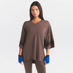 NikeSKIMS STRETCH KNIT OVERSIZED V-NECK TOP | RESIN ON A MODEL SIDE VIEW @ | FOCUS: 0.0, 1.0, 0.9