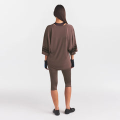 NikeSKIMS STRETCH KNIT OVERSIZED V-NECK TOP | RESIN ON A MODEL FRONT VIEW @ | FOCUS: 0.0, 1.0, 0.9