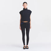 NikeSKIMS STRETCH NYLON OVERSIZED VEST | OBSIDIAN ON A MODEL FRONT VIEW @ | FOCUS: 0.0, 1.0, 0.9
