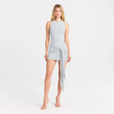 CUPRO JERSEY WRAP MINI DRESS | PEARL ON A MODEL FRONT VIEW @ | FOCUS: 0.0, 1.0, 0.9