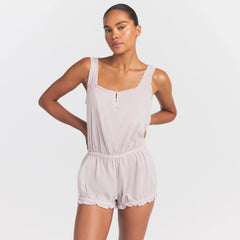 VOILE SLEEP ONESIE | LIGHT LILAC ON A MODEL SIDE VIEW @ | FOCUS: 0.0, 1.0, 0.9