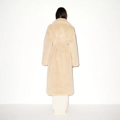 FAUX FUR OVERSIZED LONG COAT | CHAMPAGNE ON A MODEL FRONT VIEW @ | FOCUS: 0.9, 0.1, 0.7