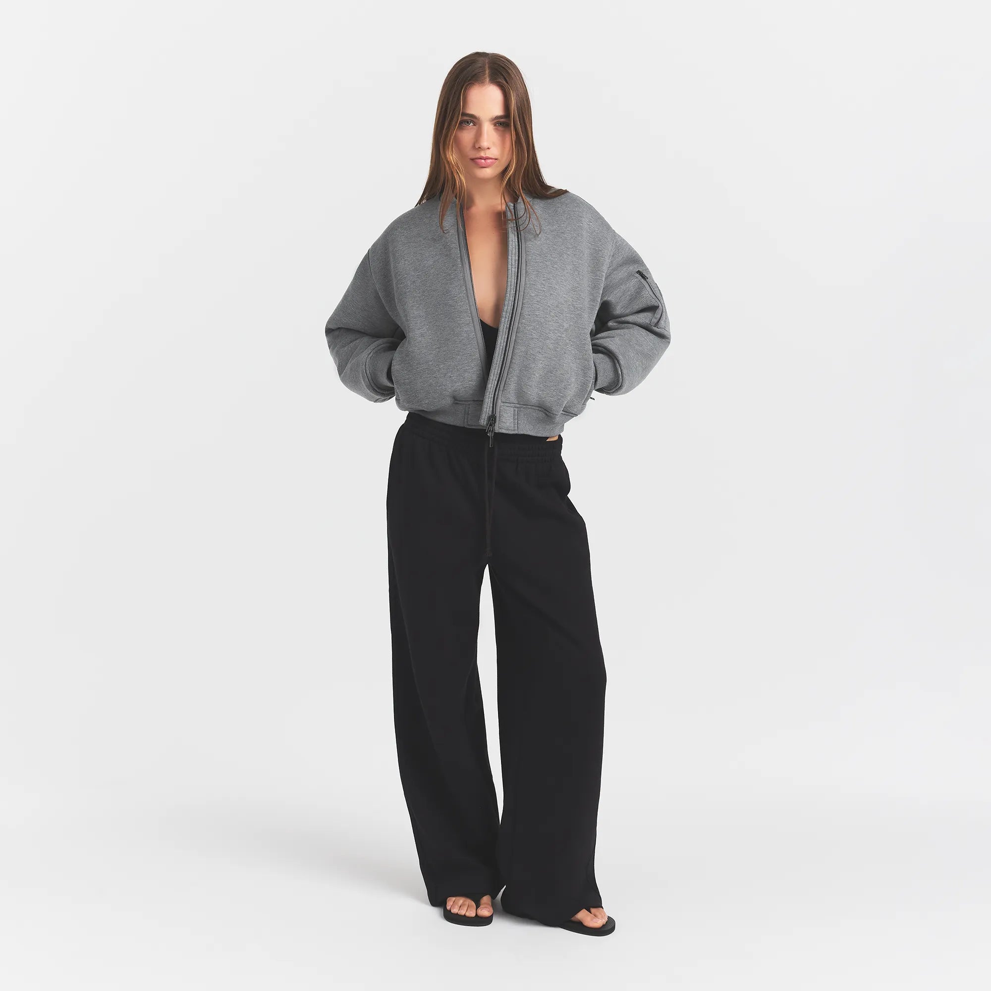NEOPRENE OUTERWEAR REVERSIBLE BOMBER JACKET | DARK HEATHER GREY ON A MODEL FRONTVIEW @ | FOCUS: 0.0, 1.0, 0.9