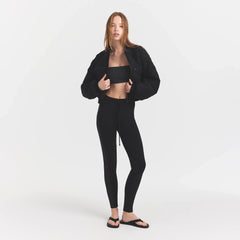 NEOPRENE OUTERWEAR REVERSIBLE BOMBER JACKET | OBSIDIAN ON A MODEL FRONTVIEW @ | FOCUS: 0.0, 1.0, 0.9