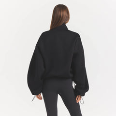 NEOPRENE OUTERWEAR OVERSIZED MOCK NECK JACKET | OBSIDIAN ON A MODEL BACK VIEW @ | FOCUS: 0.0, 1.0, 0.9