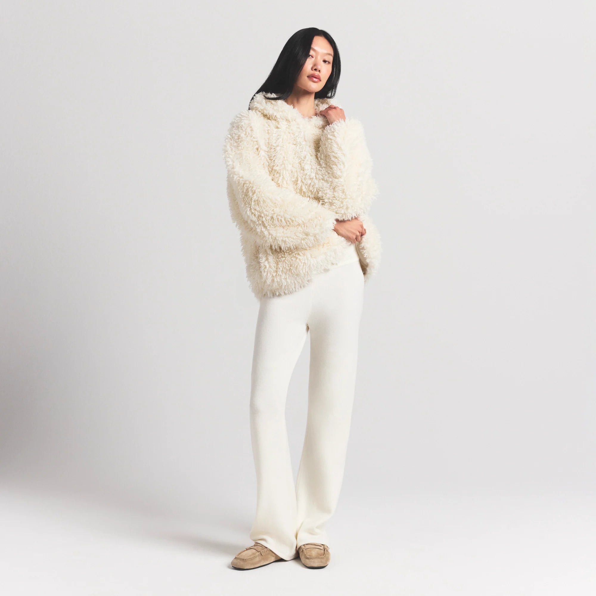 FAUX FUR HOODIE | EGRET ON A MODEL FRONT VIEW @ | FOCUS: 0.0, 1.0, 0.9