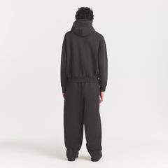 HEAVYWEIGHT FLEECE MENS HOODIE | WASHED ONYX ON A MODEL FRONT VIEW @ | FOCUS: 0.0, 1.0, 0.9