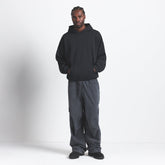 FLEECE LOUNGE MENS RELAXED HOODIE | WASHED ONYX ON A MODEL FRONT VIEW @ | FOCUS: 0.0, 1.0, 0.9
