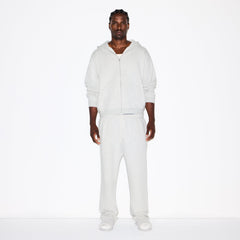 FLEECE LOUNGE MENS RELAXED ZIP UP HOODIE | LIGHT HEATHER GREY ON A MODEL FRONT VIEW @ | FOCUS: 0.0, 1.0, 0.9