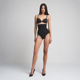 SKIMS BODY CORE SCULPT HIGH-WAISTED BRIEF | ONYX ON A MODEL FRONT VIEW