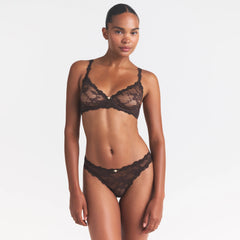 STRETCH LACE DIPPED THONG | ESPRESSO ON A MODEL SIDE VIEW @ | FOCUS: 0.0, 1.0, 0.9