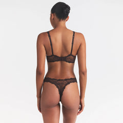 STRETCH LACE DIPPED THONG | ESPRESSO ON A MODEL SIDE VIEW @ | FOCUS: 0.0, 1.0, 0.9