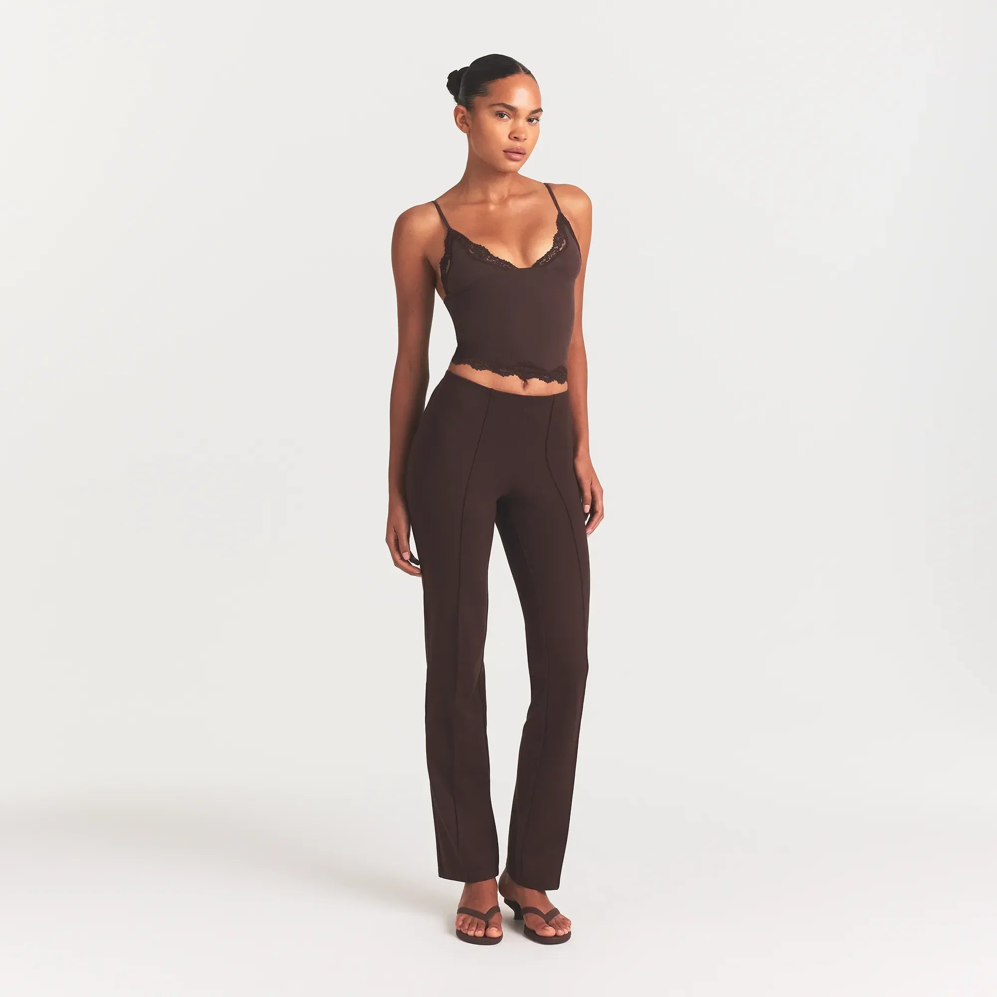 THE ESSENTIAL COLLECTION HIGH-WAISTED PINTUCK STRAIGHT PANT | ESPRESSO ON A MODEL FRONT VIEW @ | FOCUS: 0.0, 1.0, 0.9
