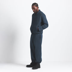 HEAVYWEIGHT FLEECE MENS JOGGER | NAVY ON A MODEL SIDE VIEW @ | FOCUS: 0.0, 1.0, 0.9