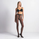 HOSIERY SHEER TIGHT | ONYX ON A MODEL FRONT VIEW @ | FOCUS: 0.0, 1.0, 0.9