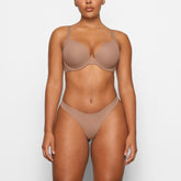 FITS EVERYBODY PUSH-UP DEMI BRA WORN BY A MODEL IN FRONT VIEW | COMP