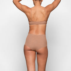 NAKED BOY SHORT WORN ON A MODEL BACK VIEW