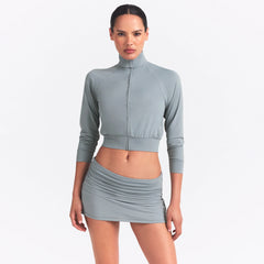 NikeSKIMS AIRY FOLDOVER SKORT | WASHED PACIFIC ON A MODEL SIDE VIEW @ | FOCUS: 0.0, 1.0, 0.9