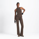 NikeSKIMS MATTE MOCK NECK RACER TANK | DARK SEPIA ON A MODEL FRONT VIEW @ | FOCUS: 0.9, 0.1, 0.7