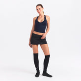 NikeSKIMS SHINE V-NECK TANK | NAVY ON A MODEL FRONT VIEW @ | FOCUS: 0.0, 1.0, 0.9
