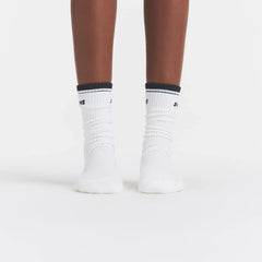 RIBBED CREW LOGO SOCK | SNOW AND ONYX ON A MODEL | FOCUS: 0.0, 1.0, 0.9
