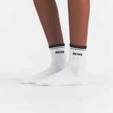 RIBBED QUARTER CREW LOGO SOCK 3-PACK | CHERRY BLOSSOM MULTI ON A MODEL | FOCUS: 0.0, 1.0, 0.9