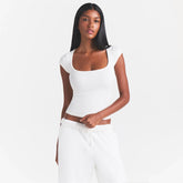 COTTON JERSEY SCOOP NECK T-SHIRT | MARBLE ON A MODEL SIDE VIEW @ | FOCUS: 0.0, 1.0, 0.9