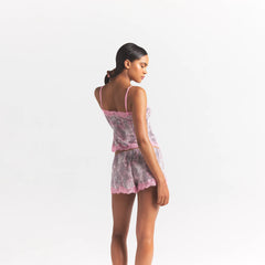 SKIMS SLEEP CAMI AND SHORT SET | BLOOM MINI MULTI ANIMAL ON A MODEL SIDE VIEW @ | FOCUS: 0.0, 1.0, 0.9