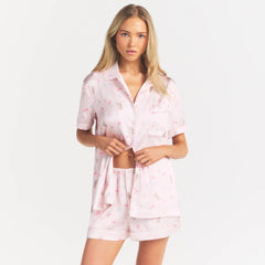 WOVEN SHINE SHORT SLEEP SET | BARELY PINK SNACK BAG ON A MODEL SIDE VIEW @ | FOCUS: 0.0, 1.0, 0.9