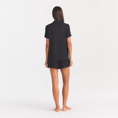 SKIMS SLEEP SHORT SLEEVE BUTTON UP SET | ONYX ON A MODEL BACK VIEW