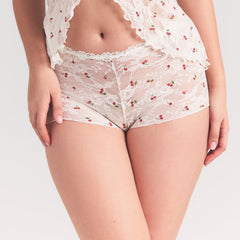 STRETCH LACE BABYDOLL TOP | IVORY CHERRY PRINT ON A MODEL SIDE VIEW @ | FOCUS: 0.0, 1.0, 0.9