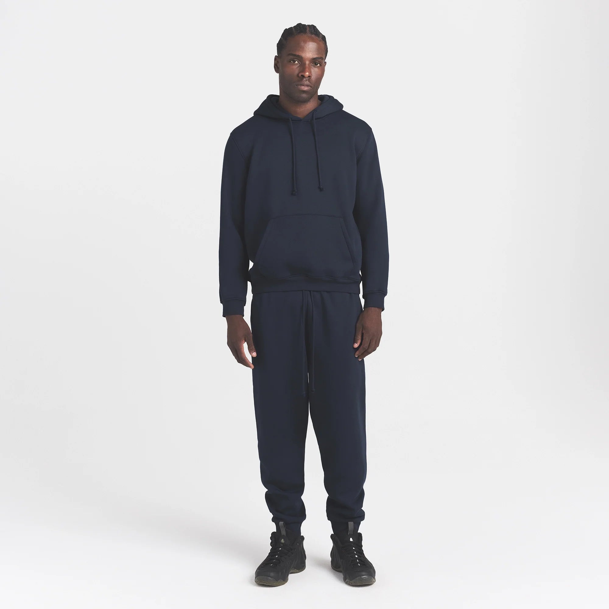 FLEECE LOUNGE MENS CLASSIC HOODIE | NAVY ON A MODEL FRONT VIEW @ | FOCUS: 0.0, 1.0, 0.9