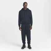 FLEECE LOUNGE MENS CLASSIC HOODIE | NAVY ON A MODEL FRONT VIEW @ | FOCUS: 0.0, 1.0, 0.9