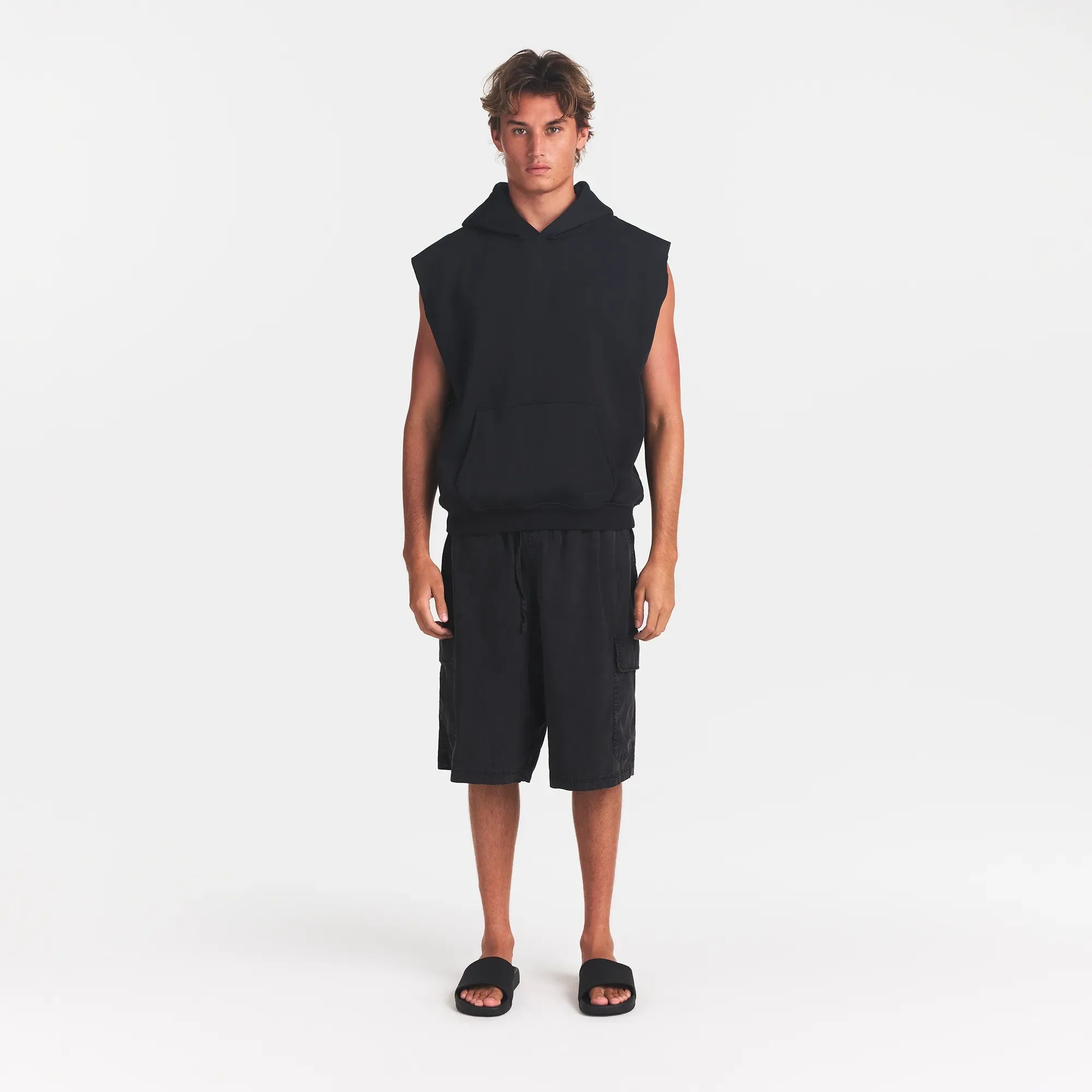 FLEECE LOUNGE MENS SLEEVELESS HOODIE | WASHED ONYX | MODEL FRONT VIEW @ | FOCUS: 0.0, 1.0, 0.9