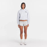 COTTON FLEECE CLASSIC HOODIE | LIGHT HEATHER GREY WITH ONYX LOGO ON A MODEL FRONT VIEW @ | FOCUS: 0.0, 1.0, 0.9