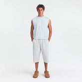 HEAVYWEIGHT COTTON MENS CROPPED TANK | ATMOSPHERE ON A MODEL FRONT VIEW @ | FOCUS: 0.0, 1.0, 0.9