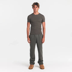 SKIMS COTTON RIB MENS T-SHIRT | JUNGLE ON A MODEL FRONT VIEW @ | FOCUS: 0.0, 1.0, 0.9