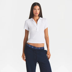 WORN IN JERSEY POLO | SNOW ON A MODEL FRONT VIEW @ | FOCUS: 0.0, 1.0, 0.9