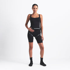 NikeSKIMS MATTE SQUARE NECK TANK | OBSIDIAN ON A MODEL FRONT VIEW @ | FOCUS: 0.9, 0.1, 0.7