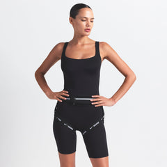NikeSKIMS MATTE SQUARE NECK TANK | OBSIDIAN ON A MODEL FRONT VIEW @ | FOCUS: 0.9, 0.1, 0.7