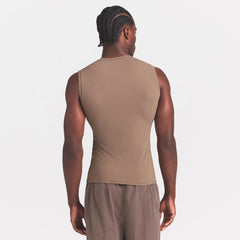 FITS EVERYBODY MENS SLIM TANK | UMBER ON A MODEL SIDE VIEW @ | FOCUS: 0.0, 1.0, 0.9