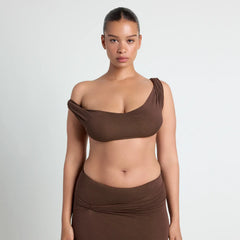 VETTESE X SKIMS SHEER MODAL DRAPED BRALETTE | COCOA ON A MODEL FRONT VIEW | FOCUS: 0.0, 1.0, 0.9