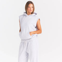 COTTON FLEECE OVERSIZED SLEEVELESS HOODIE | LIGHT HEATHER GREY ON A MODEL SIDE VIEW @ | FOCUS: 0.0, 1.0, 0.9