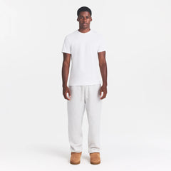 SKIMS COTTON MENS CLASSIC T-SHIRT | CHALK ON A MODEL FRONT VIEW @ | FOCUS: 0.0, 1.0, 0.9