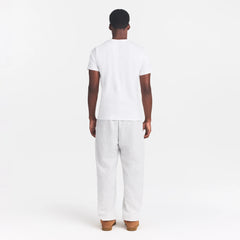 SKIMS COTTON MENS CLASSIC T-SHIRT | CHALK ON A MODEL BACK VIEW @ | FOCUS: 0.0, 1.0, 0.9